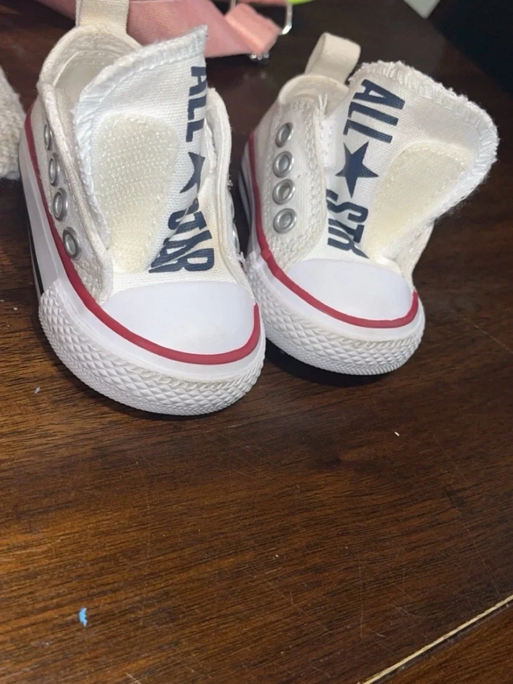 Converse Kids Canvas Slip-On Sneakers in Cream with Red Trim
